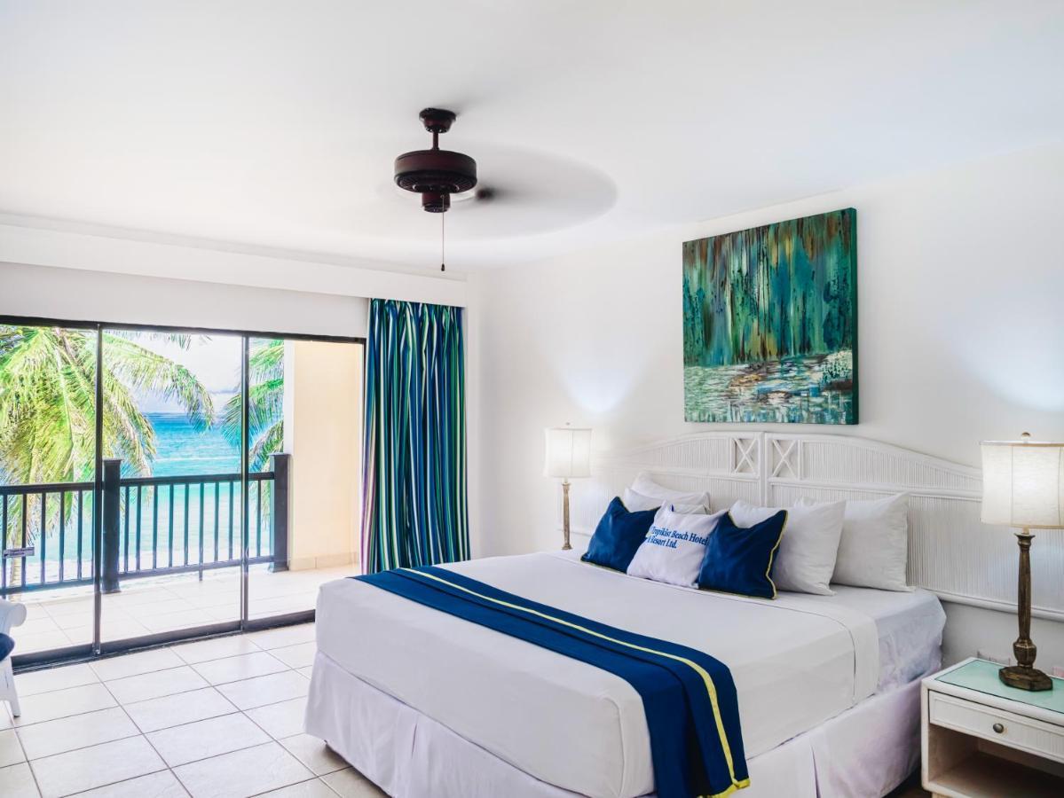 Tropikist Beach Hotel And Resort Crown Point Bagian luar foto
