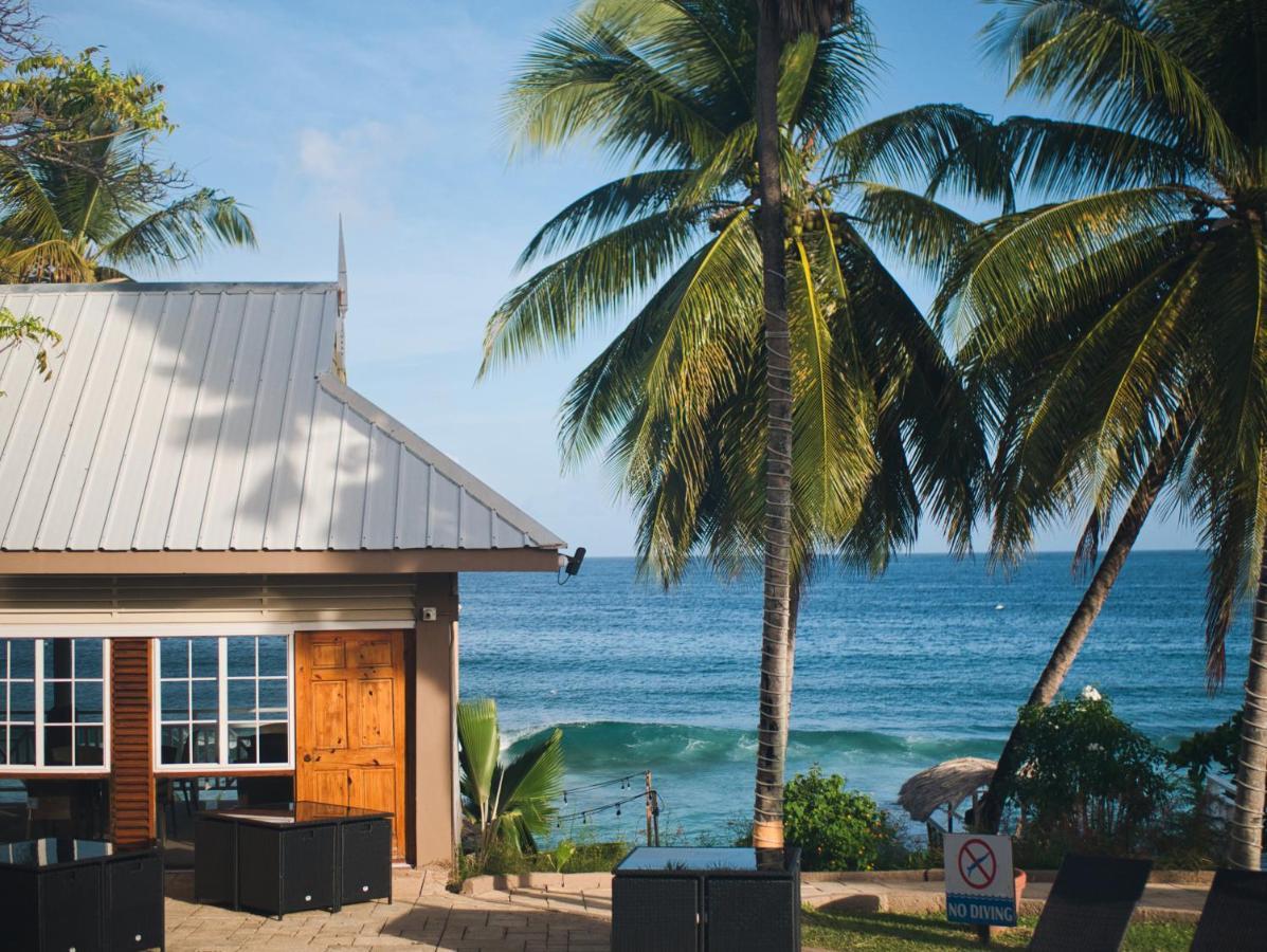 Tropikist Beach Hotel And Resort Crown Point Bagian luar foto