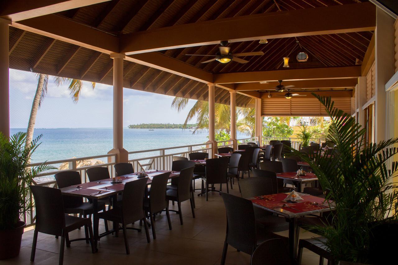 Tropikist Beach Hotel And Resort Crown Point Bagian luar foto