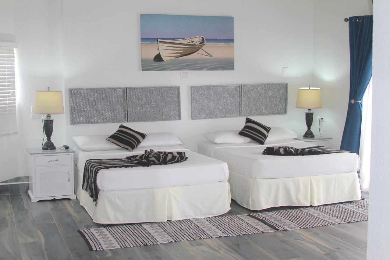 Tropikist Beach Hotel And Resort Crown Point Bagian luar foto